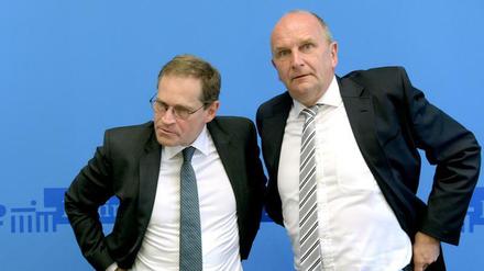 Geraten beim BER in Erklärungsnot: Berlins Regierender Bürgermeister Michael Müller (links) und Brandenburgs Ministerpräsident Dietmar Woidke.