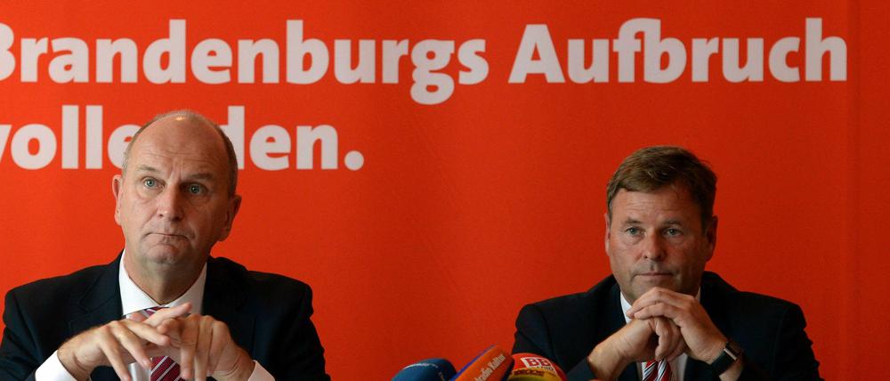 Linke Sache. Über die Koalition mit der SPD von Dietmar Woidke (links) entscheidet nun die Partei von Christian Görke. 
