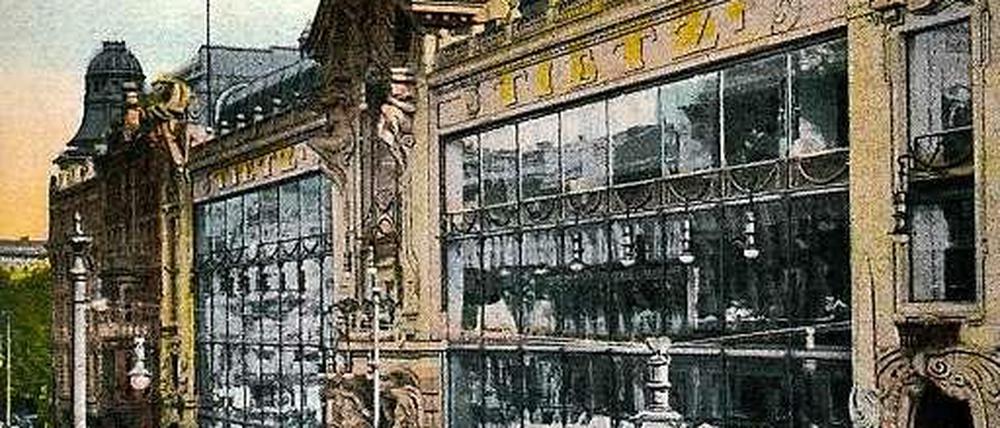 Glaspalast. Die kolorierte Postkarte zeigt das Warenhaus Tietz in der Leipziger Straße kurz nach der Eröffnung 1900. Das Dach zierten eine Weltkugel und Hermes, der Gott der Händler.