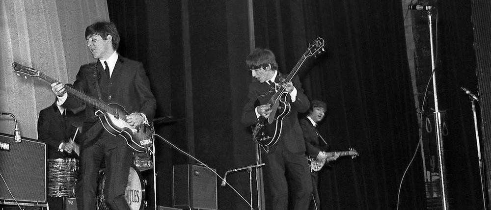 Die Beatles, Anfang 1964 in Paris.