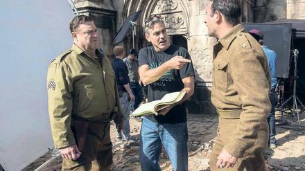 Made in Berlin-Brandenburg. George Clooney (Mitte) drehte in der Region den Kinofilm „Monuments Men“ mit John Goodman (li.) und Jean Dujardin.