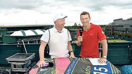 Der frühere Wimbledon-Sieger Boris Becker (l.) und der frühere Davis-Cup-Gewinner Patrik Kühnen moderieren für Sky.
