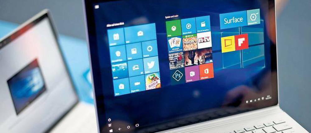 Die Tablets der neuen Generation – wie das Surface Book von Microsoft (großes Bild), das Huawei Matebook und das Samsung Galaxy TabPro S – lassen sich mit Tastatur und Touchpad verbinden – und laufen mit einem ganz normalen Windows. Fotos: dpa (2), Promo