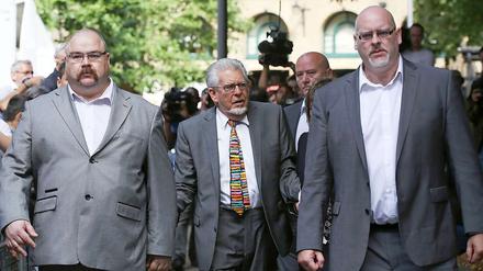 Harris (Mitte) soll fünf Jahre und neun Monate hinter Gitter.