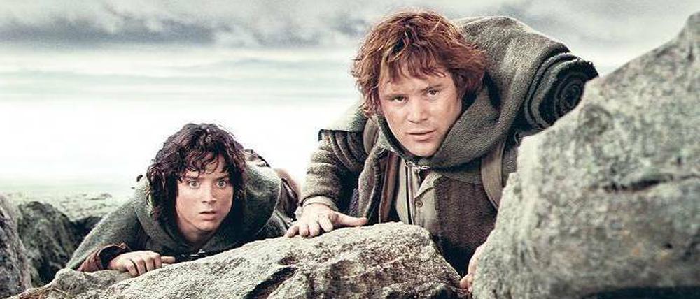 Hobbits auf der großen Reise. Elijah Wood als Frodo Beutlin und Sean Astin als Samweis Gamdschie im Film „Die zwei Türme“ aus der Trilogie „Der Herr der Ringe“. Foto: cinetext