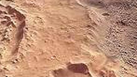 Roter Planet. Eisenoxid-Staub gibt dem Mars seine rostrote Farbe. 