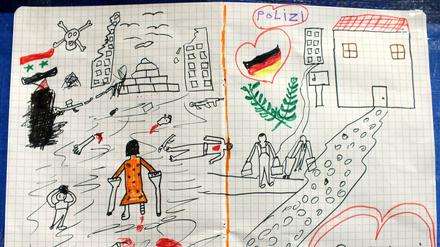 Das Foto, das die Bundespolizei am Freitag zur Verfügung stellt, zeigt ein Bild, das ein syrisches Flüchtlingskind gemalt hat. Auf dem Bild sind links Kriegseindrücke aus der Heimat- und rechts die Ankunft in Deutschland zu sehen.