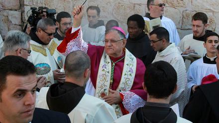 Das Oberhaupt der katholischen Kirche im Heiligen Land, der Patriarch von Jerusalem Fuad Twal, bei den Weihnachtsfeierlichkeiten in Bethlehem.