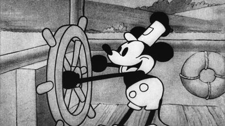 Die Zeichentrickfigur Micky Maus in einem Standbild aus dem Animationsfilm „Steamboat Willie“.