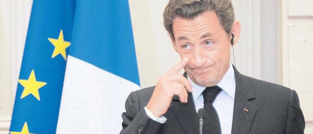 Mission Defizitabbau. Frankreichs Staatschef Sarkozy will zwölf Milliarden Euro einsparen. Foto: Horacio Villalobos/dpa