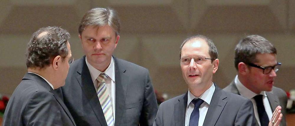 Bundesinnenminister Hans-Peter Friedrich (CSU) sowie die Innenminister von Niedersachsen, Uwe Schünemann, von Sachsen, Markus Ulbig, und von Hessen, Boris Rhein (alle CDU), während der Innenministerkonferenz.