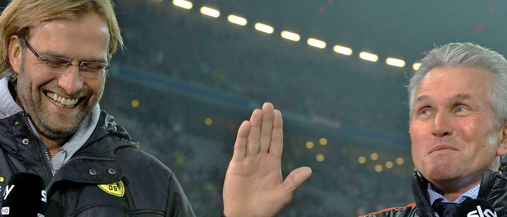 Im Land des Lächelns: So vergnügt wie auf diesem Bild aus dem November 2011 sind die beiden Bundesligatrainer Jürgen Klopp (l.) und Jupp Heynckes zurzeit nicht.