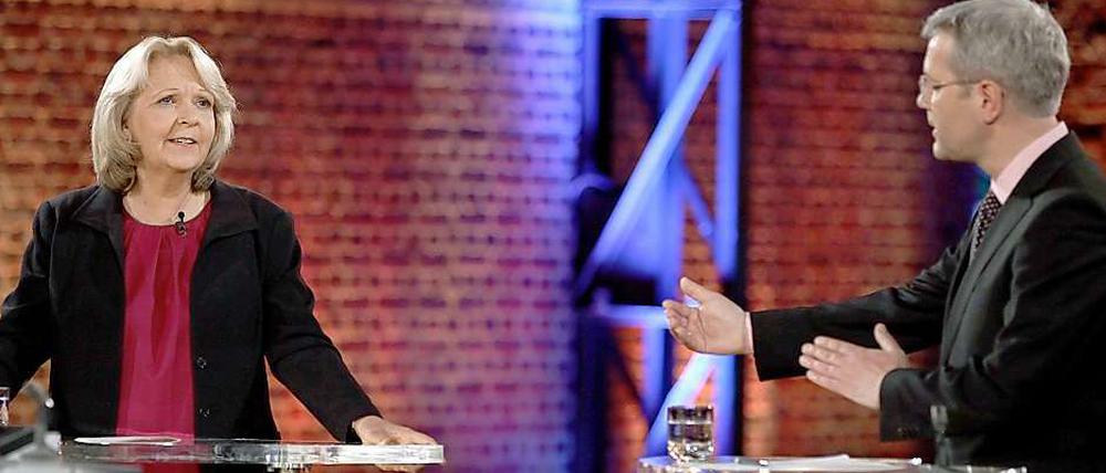 Sie ist es bereits, er will es werden. Hannelore Kraft (SPD) und Norbert Röttgen (CDU) ringen um das Ministerpräsidenten-Amt