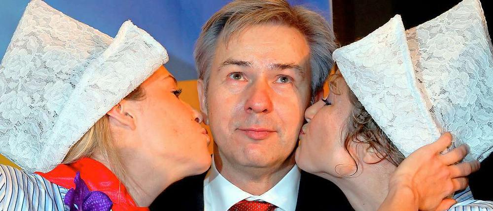 Mit Niederländern gibt es in Berlin keine Integrationsprobleme, wie die beiden Damen auf der Grünen Woche mit dem Regierenden Bürgermeister Wowereit demonstrieren.