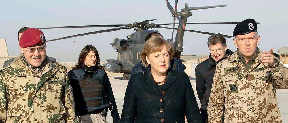 Angela Merkel spricht vom Krieg in Afghanistan