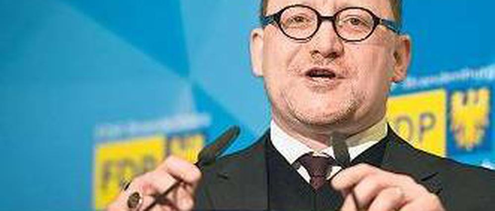 Sieger im Machtkampf. Der alte und neue FDP-Parteichef Gregor Beyer. Foto: dpa