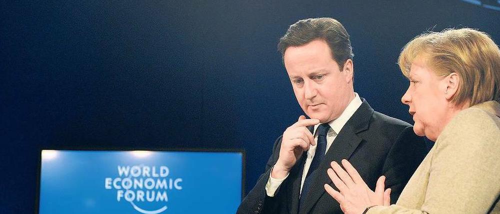Vorhut. Bundeskanzlerin Merkel und der britische Regierungschef Cameron beim Weltwirtschaftsforum in Davos.
