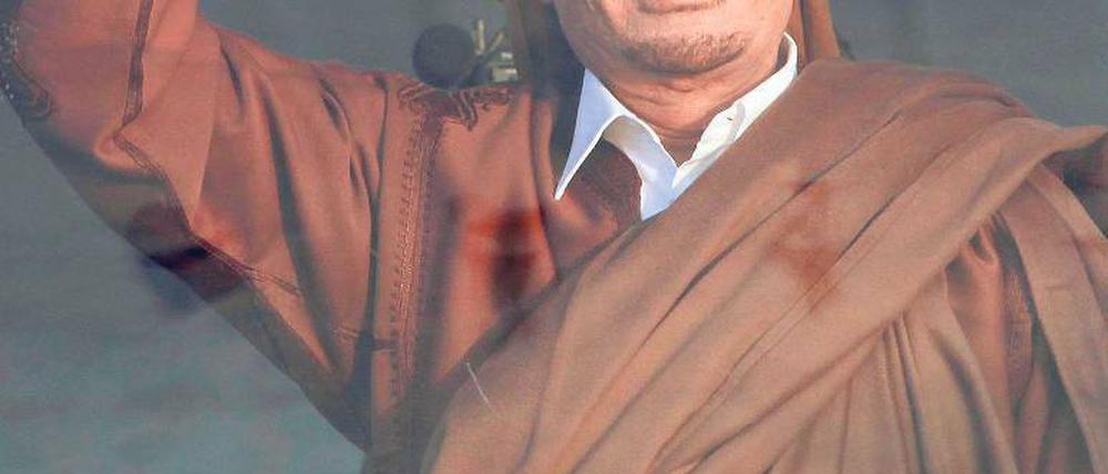 Der dienstälteste Alleinherrscher weltweit ist Gaddafi – und er will es bleiben. Am Sonntag, dem Prophetengeburtstag, inszenierte er die Einheit von Volk und Führer. Foto: rtr