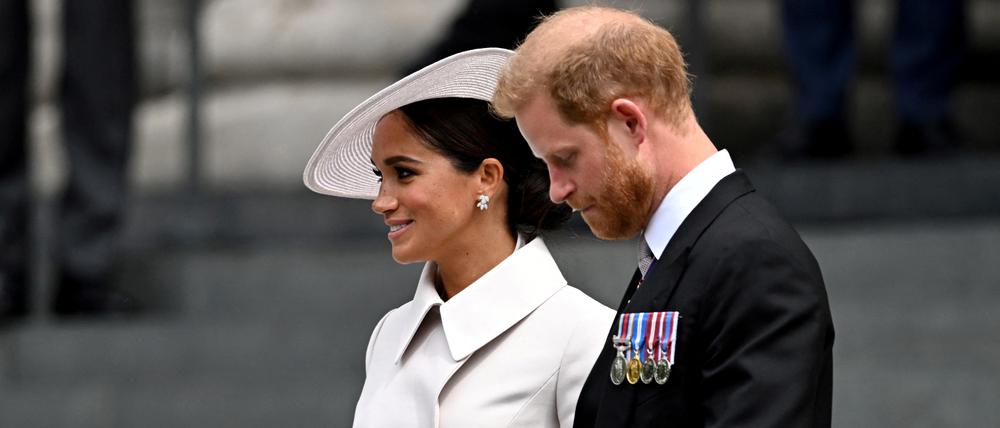 FILE PHOTO: Britain's Prince Harry and his wife Meghan, Duchess of Sussex, leave after the National Service of Thanksgiving held at St Paul's Cathedral as part of celebrations marking the Platinum Jubilee of Britain's Queen Elizabeth, in London, Britain, June 3, 2022. REUTERS/Dylan Martinez/File Photo