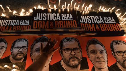 (FILES) In this file photo taken on June 23, 2022 Brazilian indigenous people protest for the demarcation of indigenous land and over the murder of British journalist Dom Phillips and Brazilian Indigenous affairs specialist Bruno Pereira, in Sao Paulo, Brazil. (Photo by NELSON ALMEIDA / AFP)