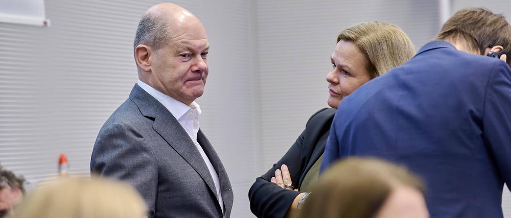 Bundeskanzler Olaf Scholz und Innenministerin Nancy Faeser.