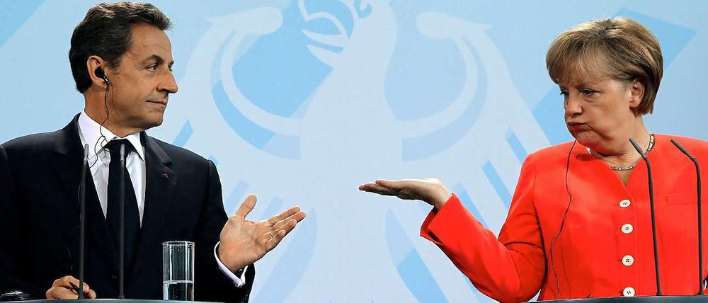 Von Krisengipfel zu Krisengipfel sind Nicolas Sarkozy und Angela Merkel im Jahr 2011 geeilt. Wo aber blieb da die demokratische Legitimation?