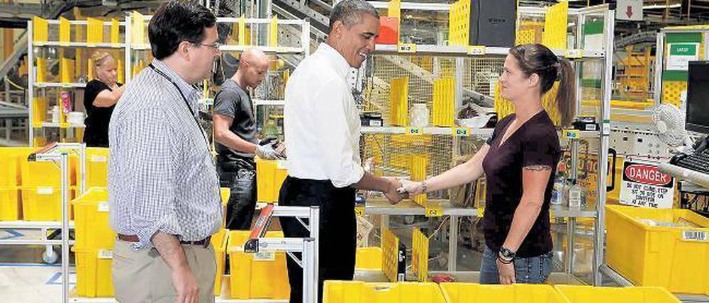 Gut sortiert. Präsident Barack Obama besucht ein Amazon-Vertriebszentrum in Chattanooga, Tennessee. 
