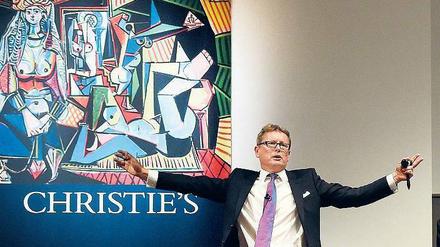 Zum Ersten, Zweiten, Dritten. Auktionator Jussi Pylkkanen nimmt die letzten Gebote für Picassos „Frauen von Algier“ entgegen, um dann bei 180 Millionen Dollar den Hammer fallen zu lassen. 