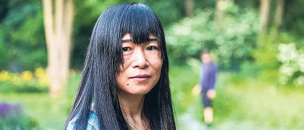 Nomadin. Zheng Xiaoqiong (38) schreibt Gedichte über ihre Erfahrungen als Wanderarbeiterin in einer Metallfabrik. 