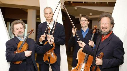 Das Quartett: Primgeiger Daniel Stabrawa, Bratscher Neithard Resa, Cellist Dietmar Schwalke und Geiger Christian Stadelmann (v.l.)