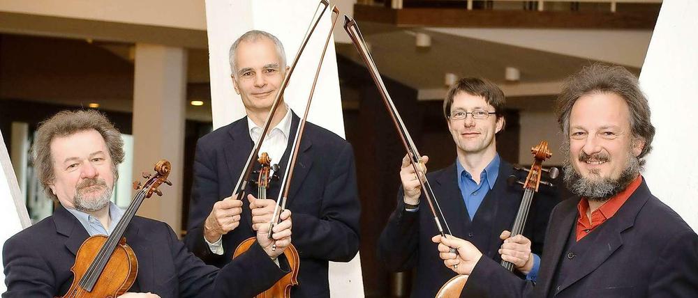 Das Quartett: Primgeiger Daniel Stabrawa, Bratscher Neithard Resa, Cellist Dietmar Schwalke und Geiger Christian Stadelmann (v.l.)