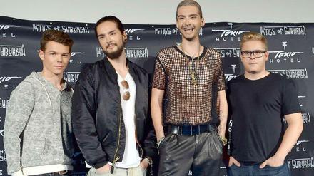 Die Musiker Georg Listing, Tom Kaulitz, Bill Kaulitz und Gustav Schäfer (v.l.n.r.) von Tokio Hotel stellen am 2.Oktober in Berlin ihr neues Album "Kings Of Suburbia" vor, das am Freitag erscheint. 