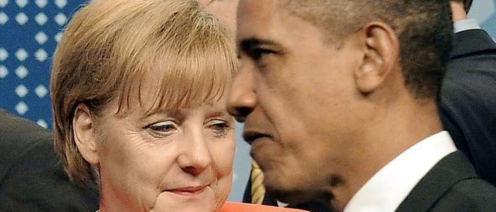Bundeskanzlerin Angela Merkel und US-Präsident Barack Obama in Toronto am Rande der G20-Sitzung. -