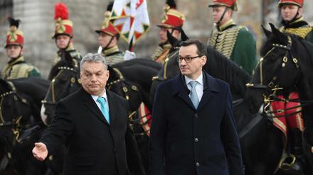 Von draußen droht Gefahr - darin sind sich die Regierungschefs von Ungarn und Polen, Viktor Orbán (links) und Mateusz Morawiecki, einig.