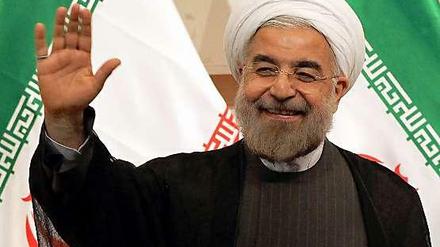 Verbirgt sein Lächeln mehr, als es offenbart? Irans Präsident Hassan Rohani.