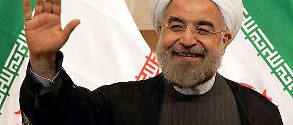 Verbirgt sein Lächeln mehr, als es offenbart? Irans Präsident Hassan Rohani.