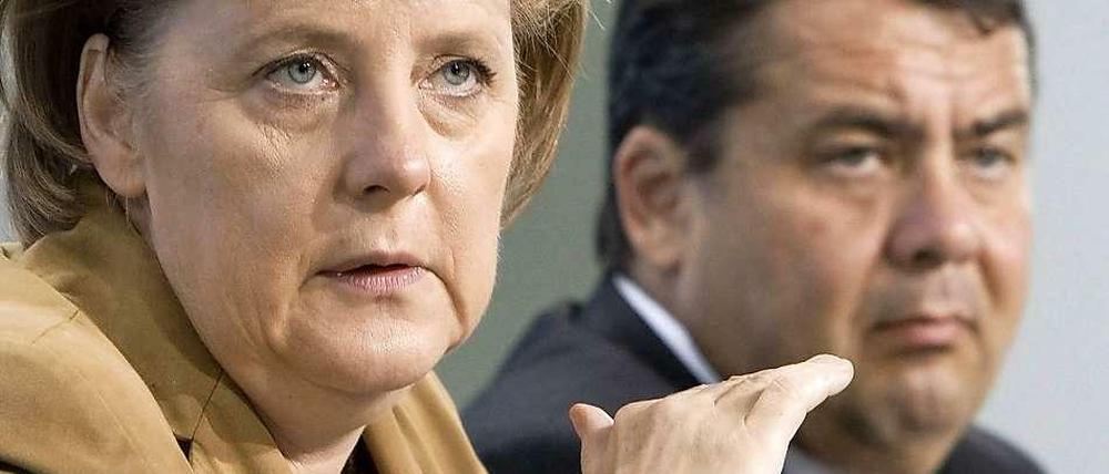 Angela Merkel und Sigmar Gabriel - wer behält im Sondierungspoker die Nerven?