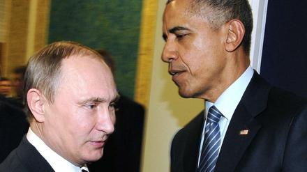 Russlands Präsident Vladimir Putin und US Präsident Barack Obama am Rande der UN-Klimakonferenz in Paris.