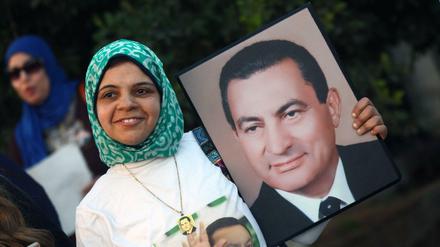 Mubaraks Anhänger bejubeln dessen Freispruch am 2. März.  