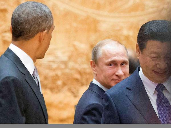 Um Kooperation bemüht. Die Lenker der Weltmächte, Obama, Putin und Xi auf dem Apec-Gipfel.