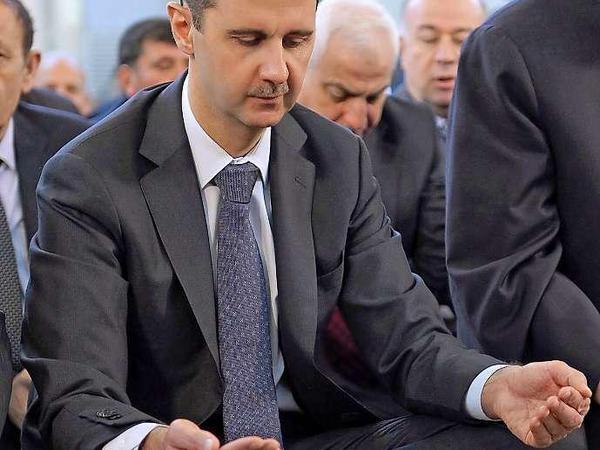 Syriens Präsident Bashar al-Assad im Gebet: Gute Miene im bösen Krieg