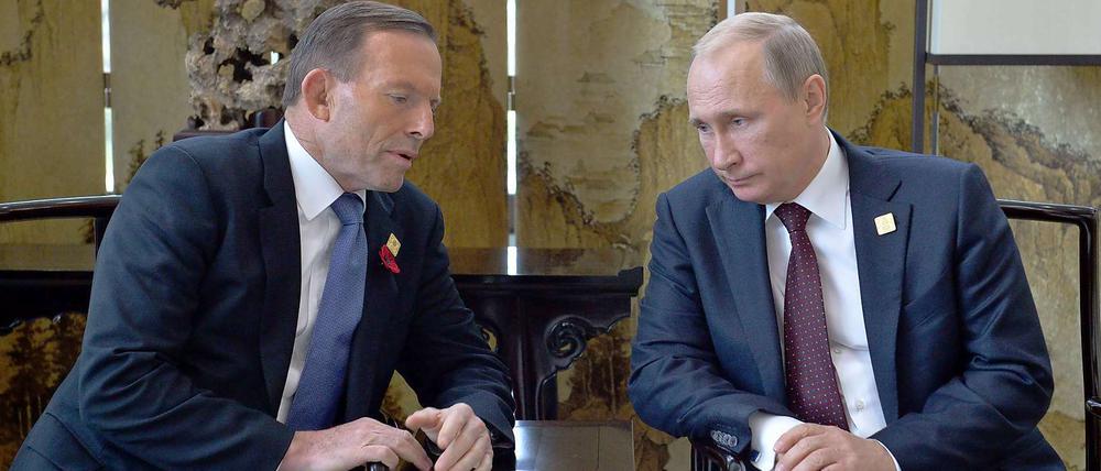 Der russische Präsident Wladimir Putin (rechts) mit dem australischen Premierminister Tony Abbott am Rande des Apec-Gipfels in Peking.