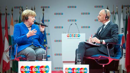 Global Solutions: Bundeskanzlerin Angela Merkel im Gespräch mit Moderator Evan Davis