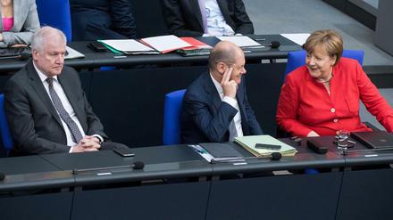 Innenminister Horst Seehofer, Finanzminister Olaf Scholz und Kanzlerin Angela Merkel