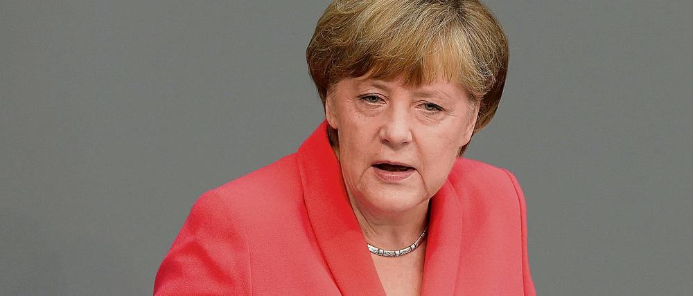 Bundeskanzlerin Angela Merkel (CDU) spricht am 17.07.2015 während der Sondersitzung des Deutschen Bundestages zu Griechenland-Hilfspaketen in Berlin. 