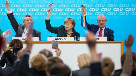 Alle dafür: Der kleine Parteitag der CDU stimmt für die Koalition mit SPD und CSU - ohne Gegenstimme, bei zwei Enthaltungen.