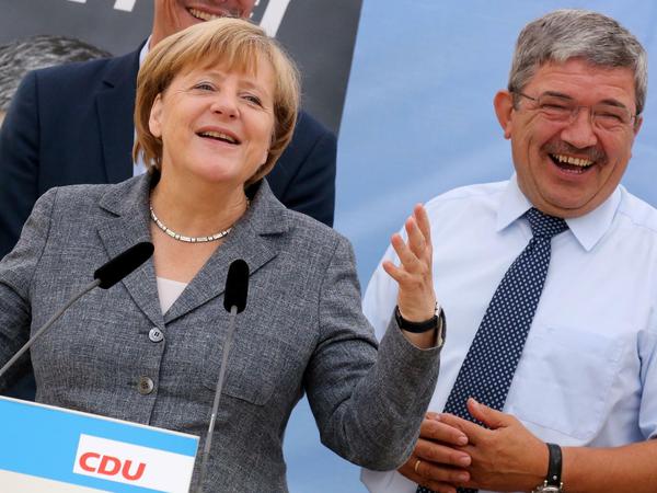 Am Samstag gingen Angela Merkel Lorenz Caffier noch gemeinsam auf Stimmenfang.