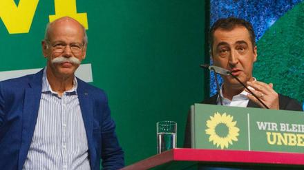 Grünen-Vorsitzender Cem Özdemir versucht die Wogen vor dem Auftritt des Daimler-Chefs Dieter Zetsche beim Parteitag der Grünen zu glätten. 