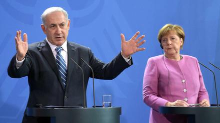 Israels Ministerpräsident Benjamin Netanyahu und Bundeskanzlerin Angela Merkel bei ihrer gemeinsamen Pressekonferenz am Dienstag in Berlin.