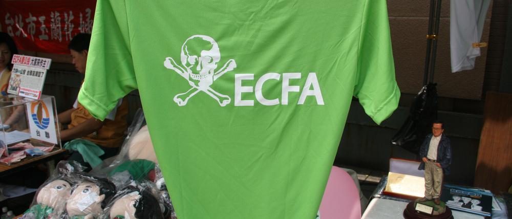 T-Shirt auf einer Anti-Ecfa-Demonstration.